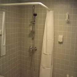 Bathroom without bathtub and shower with curtain photo