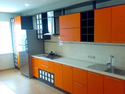 Orange kitchen with brown photo