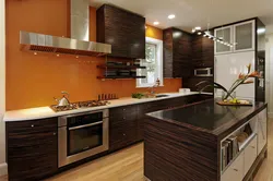 Orange kitchen with brown photo