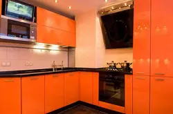 Orange Kitchen With Brown Photo