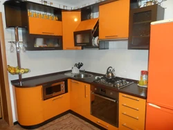 Orange kitchen with brown photo