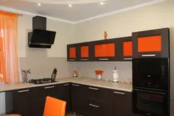 Orange kitchen with brown photo