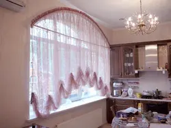 Curtain for the kitchen with a short arch photo