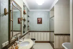 Bathroom design with decorative plaster and tiles photo