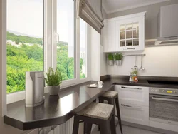 Kitchen interior by the window in the apartment