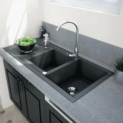 Kitchen design with black sink photo