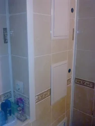 Як схаваць трубы ў ваннай панэлямі фота