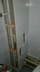 How to hide pipes in the bathroom with panels photo