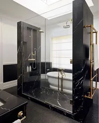 Black shower in the bathroom interior