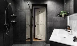 Black shower in the bathroom interior