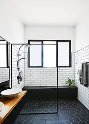 Black shower in the bathroom interior