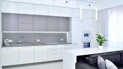 Кухня с серой столешницей в интерьере белая и фартуком