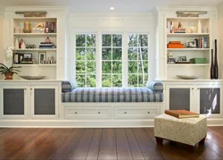 Kitchen Living Room Interior With Sofa By The Window