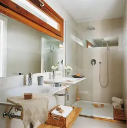 Small bathtub in the bathroom interior photo