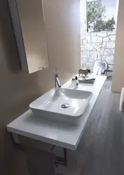 Bathtub design with countertop sink photo