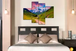 Large paintings in the bedroom above the bed photo
