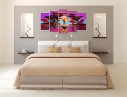 Large paintings in the bedroom above the bed photo