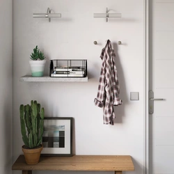 Photo wall shelves in the hallway