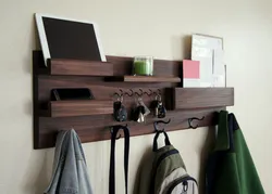 Photo wall shelves in the hallway