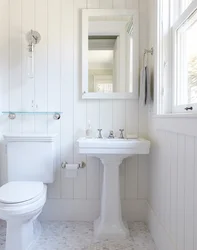 White panels in the bathroom interior
