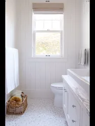 White panels in the bathroom interior