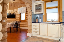 Kitchen design for home made of rounded logs