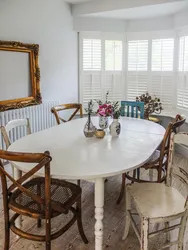 Different chairs in the kitchen in the interior photo