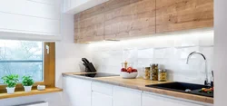 Kitchen With Wooden Countertop And Wood-Effect Apron Design Photo