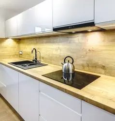 Kitchen with wooden countertop and wood-effect apron design photo