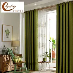 Green curtains living room design photo