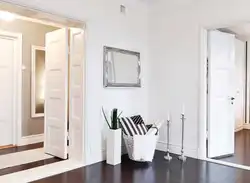 Apartment design with white doors