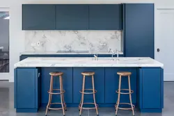 Kitchen with blue countertop and apron photo