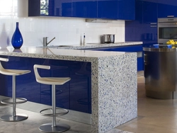 Kitchen With Blue Countertop And Apron Photo