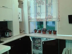 Niche under the window in the kitchen in Khrushchev design ideas