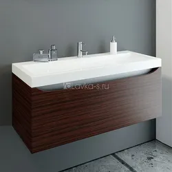 Bathtub with wall-hung sink photo