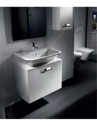 Bathtub with wall-hung sink photo