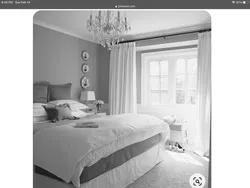 White curtains in the bedroom interior