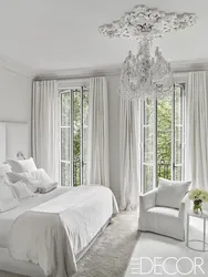 White curtains in the bedroom interior