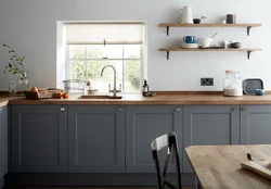 Gray kitchen with wood-look countertop photo