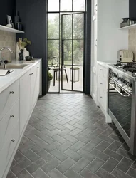 Gray tiles in the kitchen on the floor photo in the interior