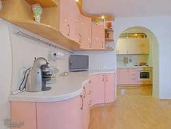 Peach-colored kitchen in the interior photo