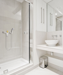 White bathrooms with showers photo