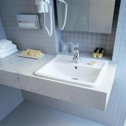 Bathtub design with countertop sink