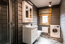 Bathroom design in a wooden house with a window