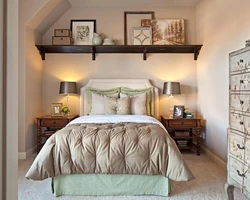 Shelf above the bed in the bedroom photo