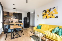Yellow sofa in the kitchen in the interior photo