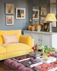 Yellow sofa in the kitchen in the interior photo