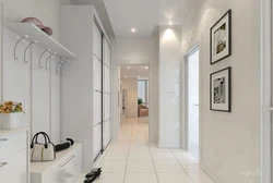 Design of a narrow hallway in an apartment in a modern style