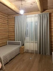 Шторы в деревянной спальне фото
