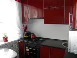 Red interior of a small kitchen